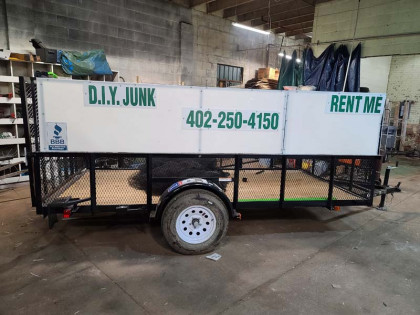 A DIY dumpster rental trailer that is available for rent